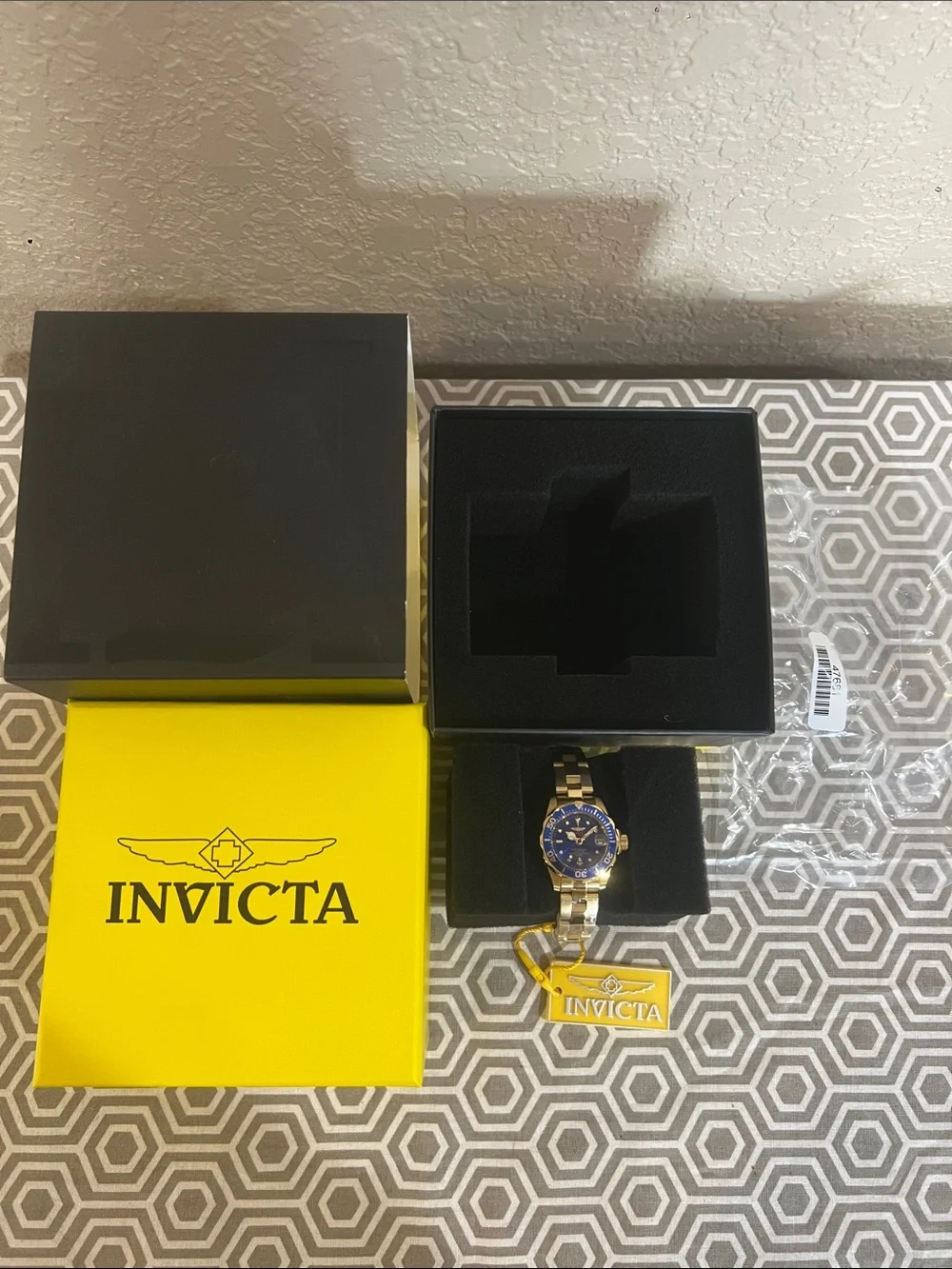 Invicta Gold Tone Watch with Blue Dial and Bezel